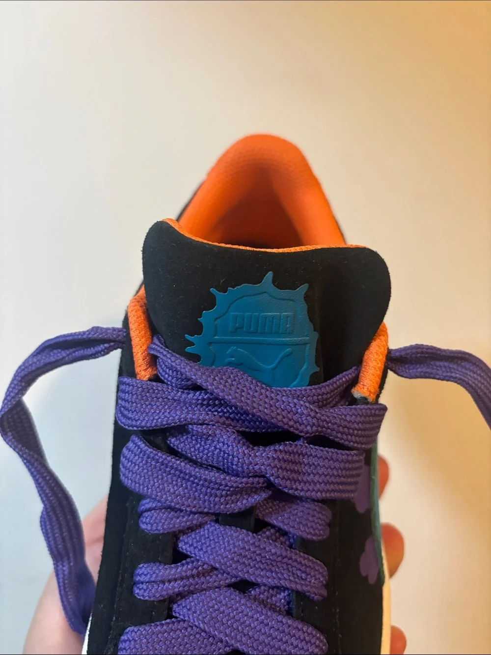 Puma Kids Black Sneakers with Purple Laces and Orange Interior Trim